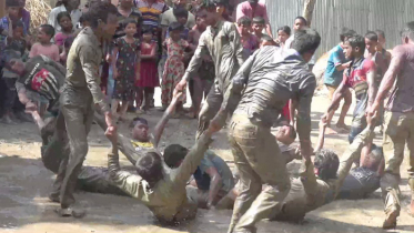 লালমনিরহাটে ঐতিহ্যবাহী শারিরীক শক্তির ‘নারিকেল খেলা’