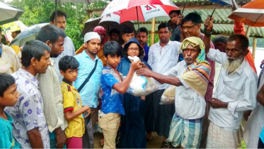 ইটিভি-একুশে ফোরামের উদ্যোগে ত্রাণ বিতরণ