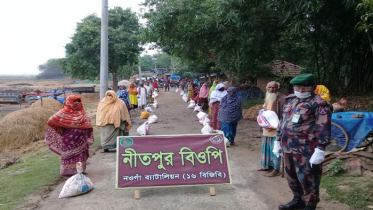 নওগাঁয় ২৫৫ পরিবারকে খাদ্য সহায়তা দিল বিজিবি