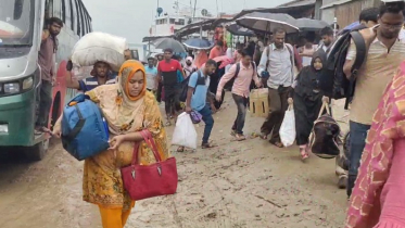 বৃষ্টিতে দৌলতদিয়ায় বেড়েছে যাত্রী দুর্ভোগ