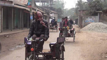 হিলিতে তীব্র শীতে বিপাকে খেটে খাওয়া মানুষ