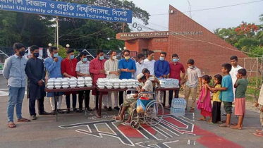 দরিদ্রদের মাঝে শাবি ছাত্রলীগের ইফতার বিতরণ