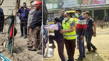 ঝাড়ুতে জাতীয় পতাকা টাঙিয়ে নিরাপত্তা প্রহরী জেলে